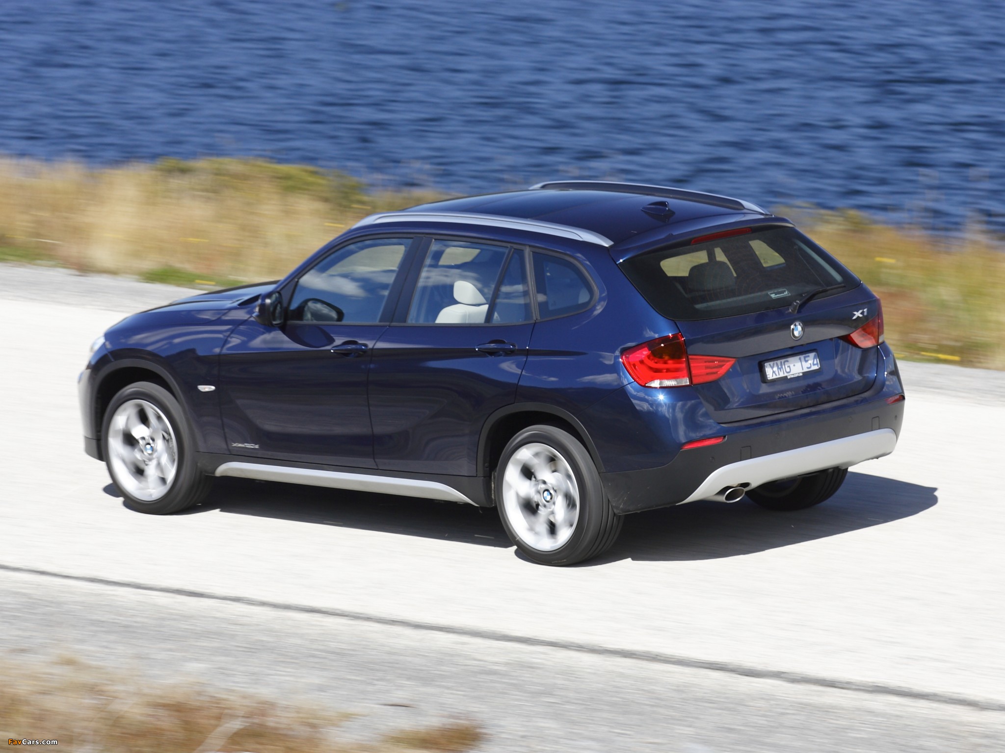 Photos of BMW X1 xDrive20d AU-spec (E84) 2010–12 (2048 x 1536)