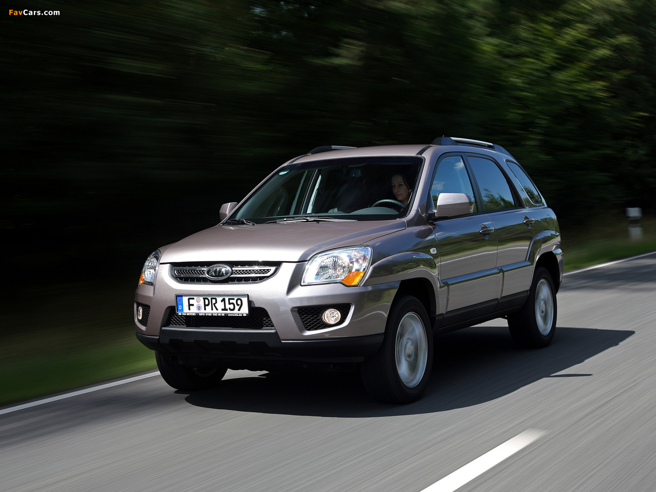 Kia Sportage (KM) 2009–10 images (1280 x 960)