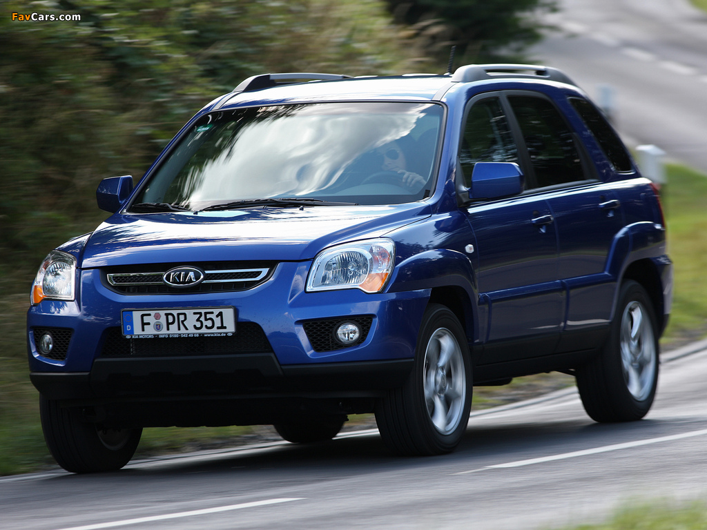 Kia Sportage (KM) 2009–10 photos (1024 x 768)