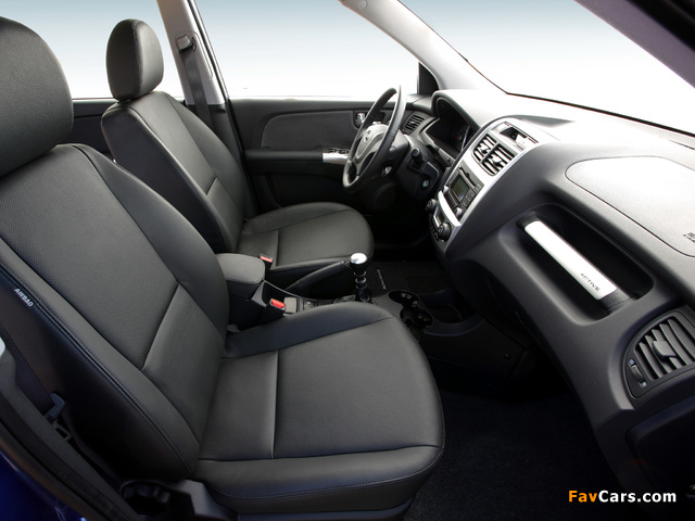 Kia Sportage (KM) 2009–10 photos (640 x 480)