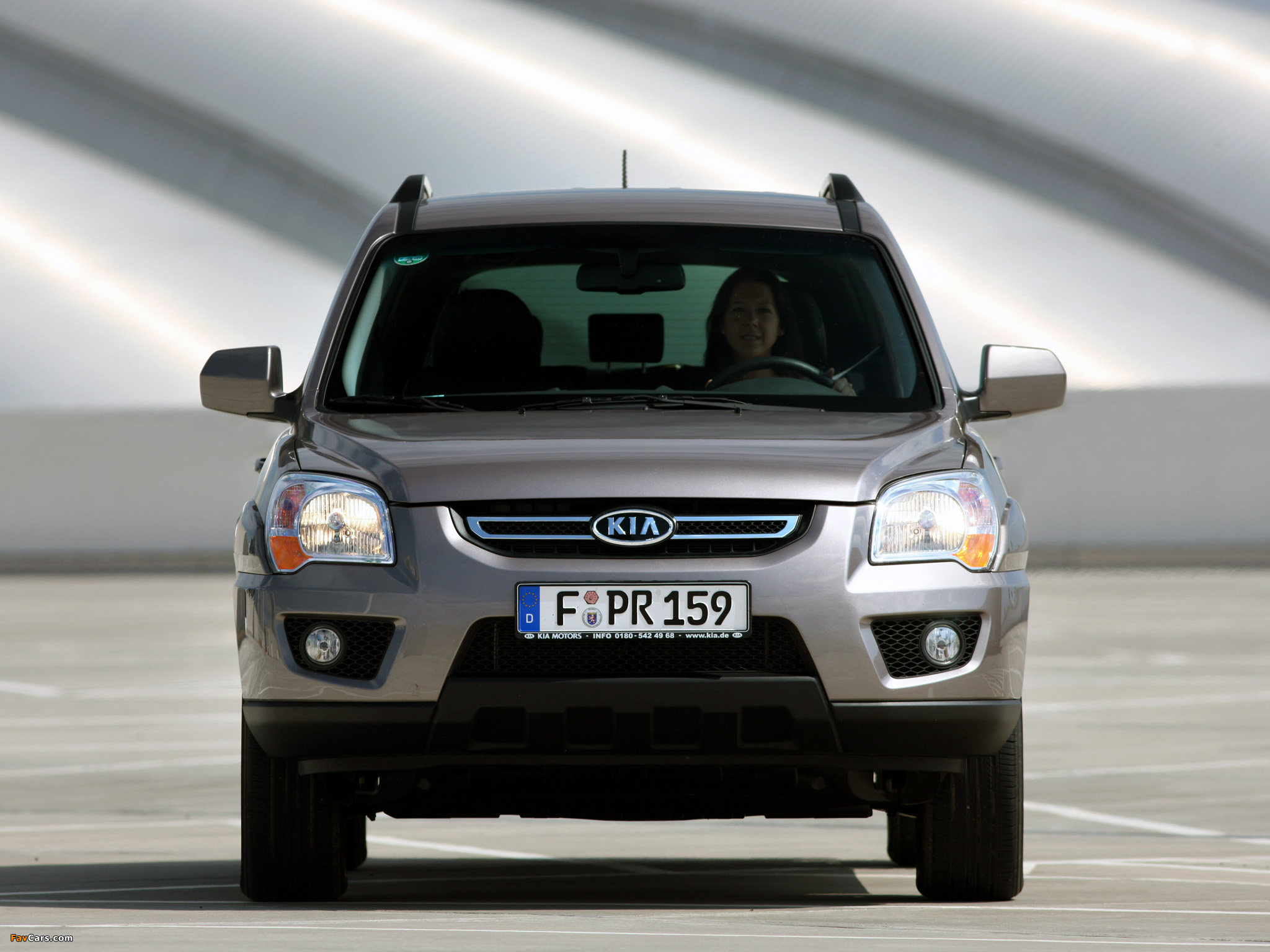 Kia Sportage (KM) 2009–10 pictures (2048 x 1536)