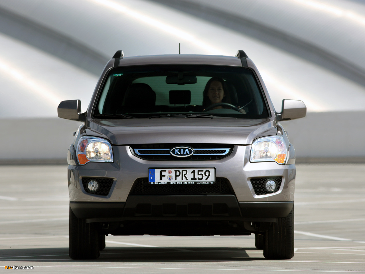 Kia Sportage (KM) 2009–10 pictures (1280 x 960)