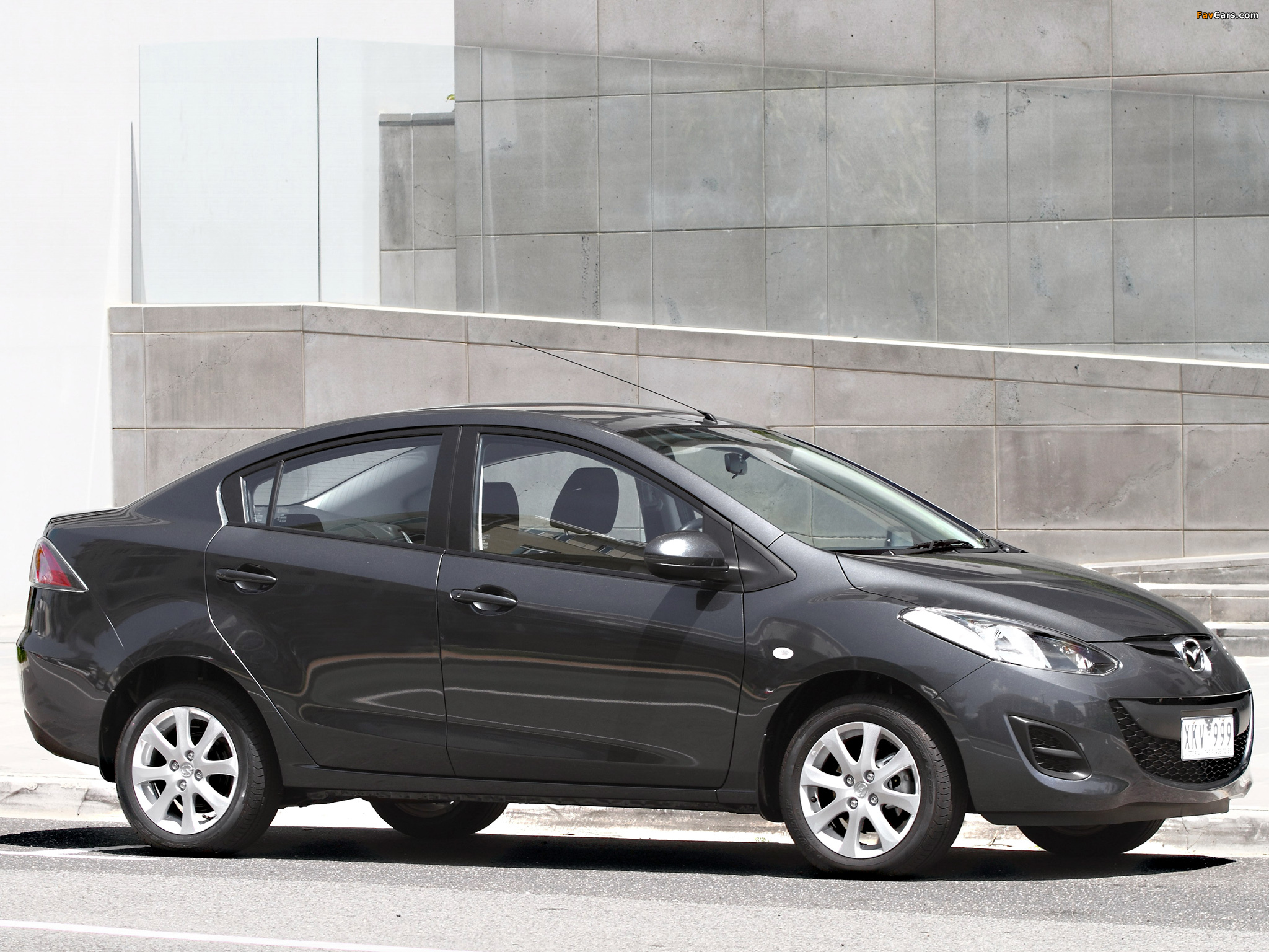 Photos of Mazda2 Sedan AU-spec (DE2) 2010–12 (2048 x 1536)