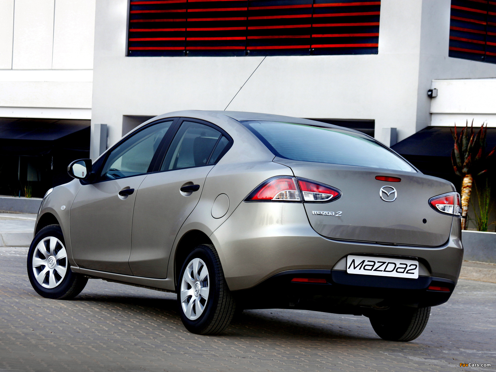 Pictures of Mazda2 Sedan ZA-spec (DE2) 2010–12 (1600 x 1200)