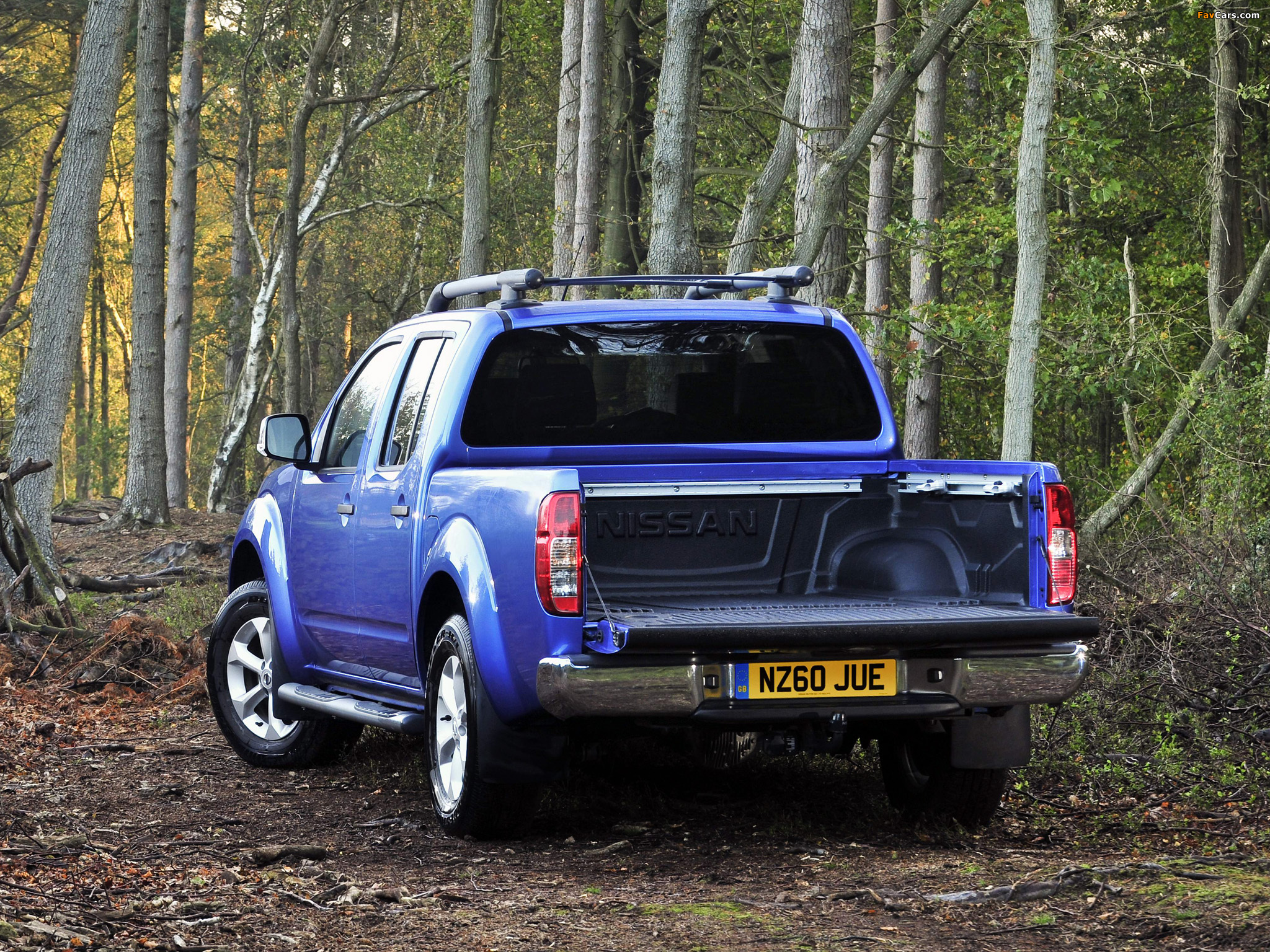 Nissan Navara Double Cab UK-spec (D40) 2010 photos (2048 x 1536)