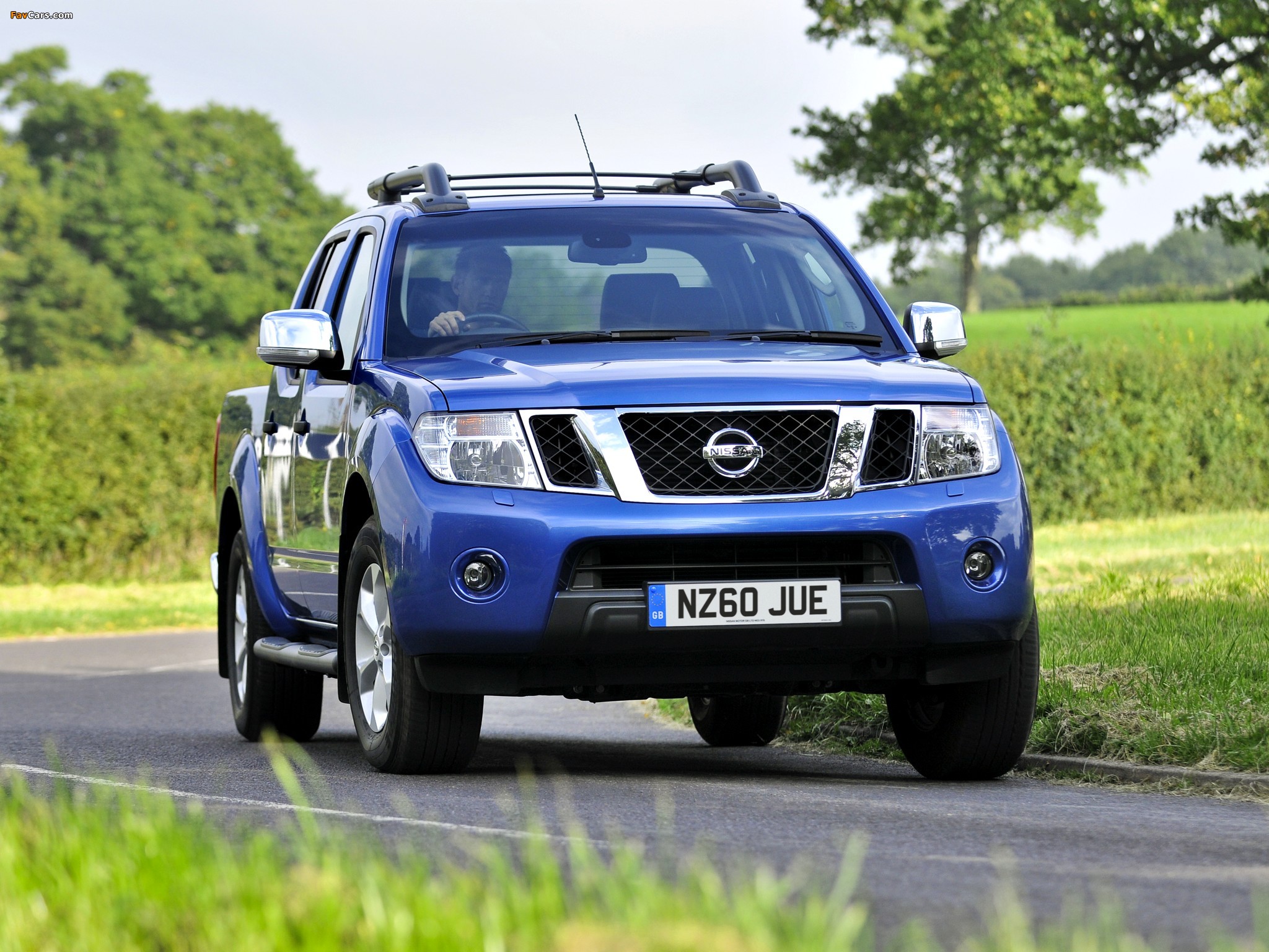 Photos of Nissan Navara Double Cab UK-spec (D40) 2010 (2048 x 1536)