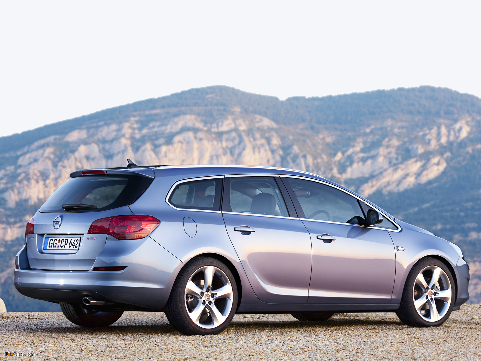 Opel Astra Sports Tourer (J) 2010–12 pictures (1600 x 1200)
