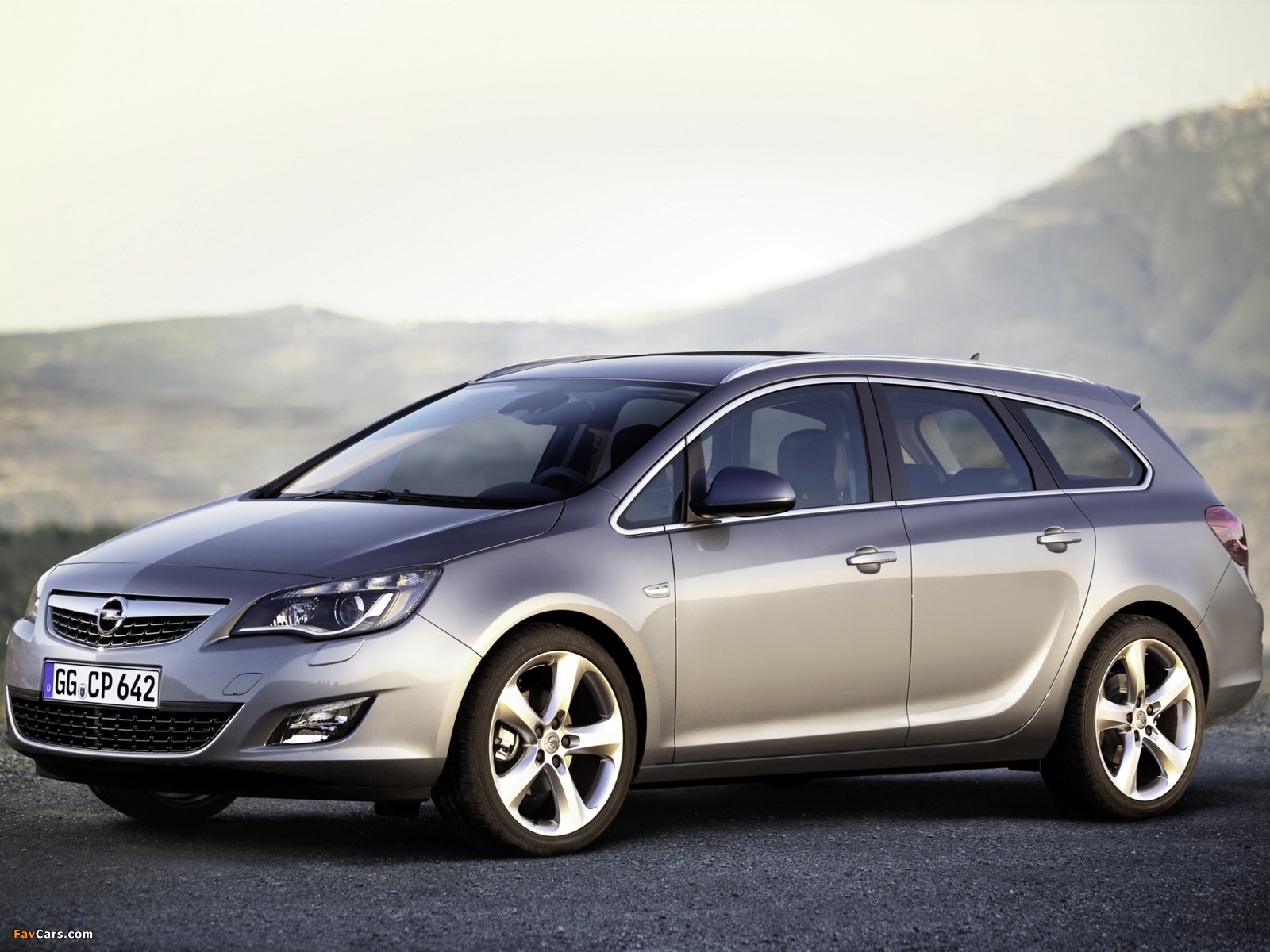 Opel Astra Sports Tourer (J) 2010–12 pictures (1600 x 1200)