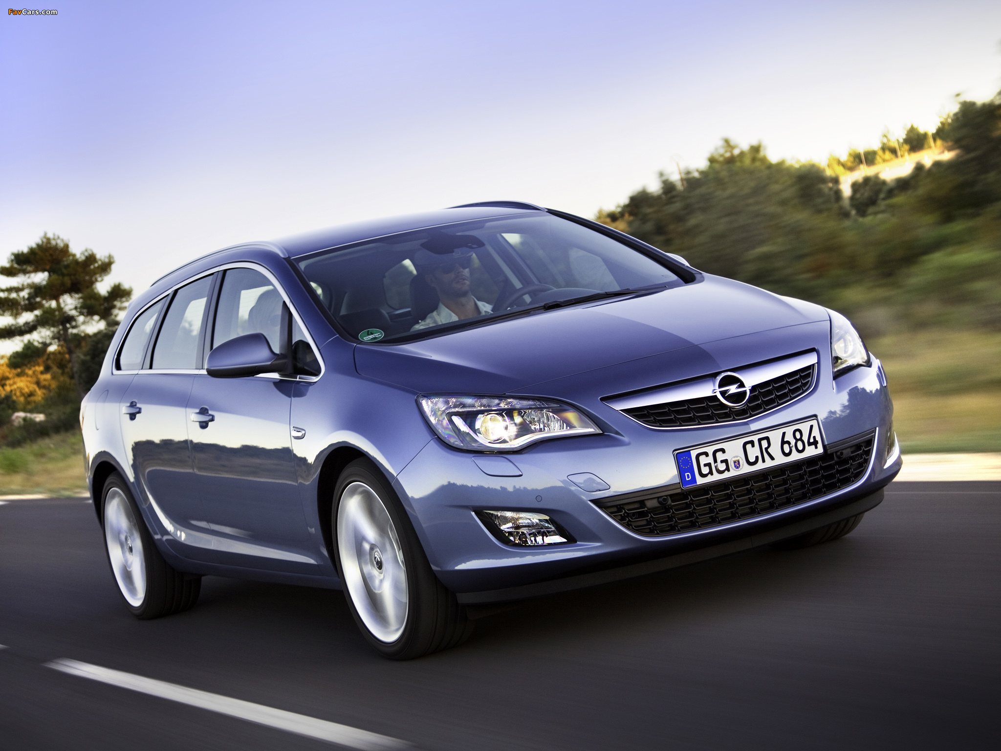 Opel Astra Sports Tourer (J) 2010–12 pictures (2048 x 1536)