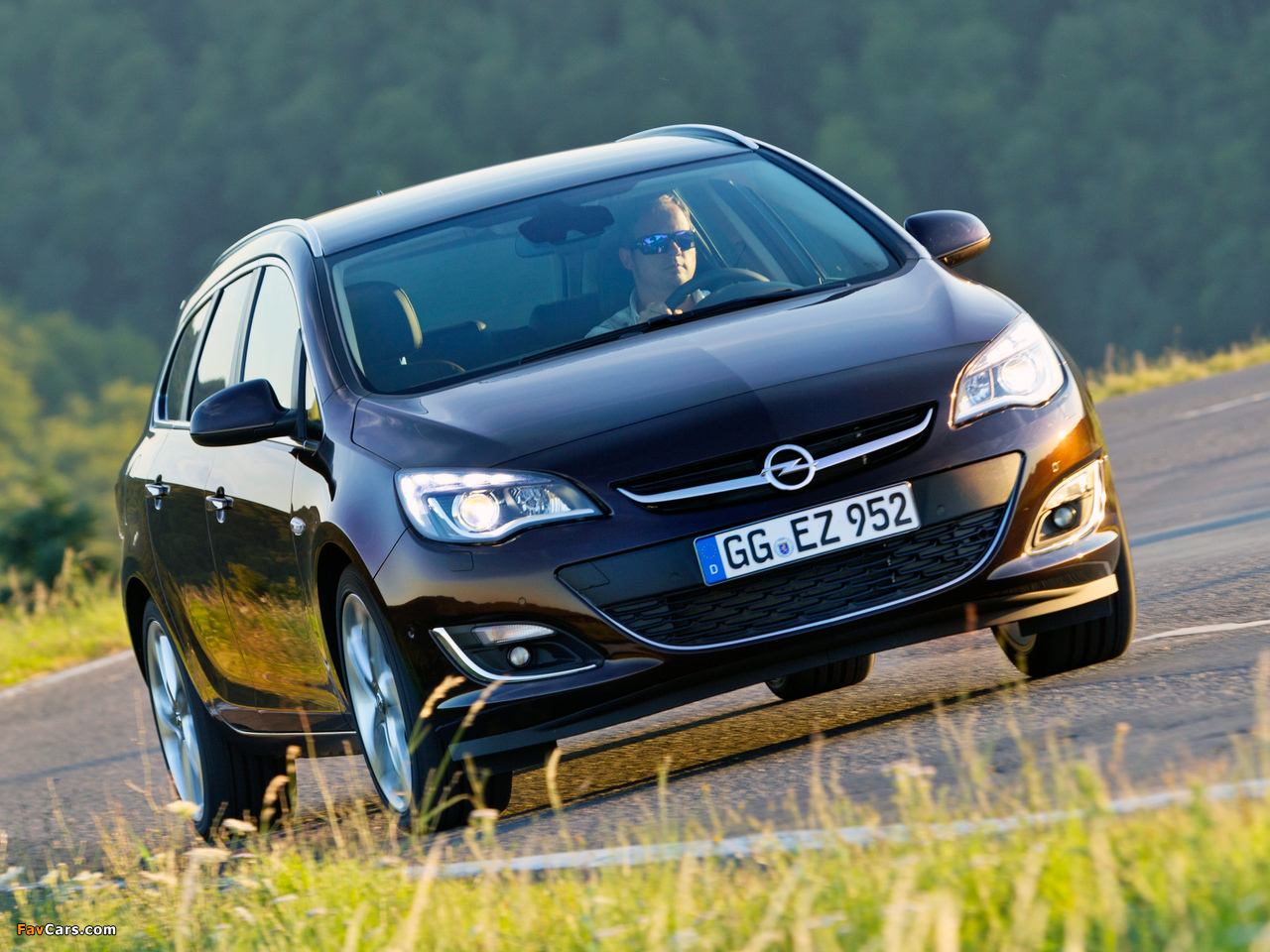 Opel Astra Sports Tourer (J) 2012 photos (1280 x 960)