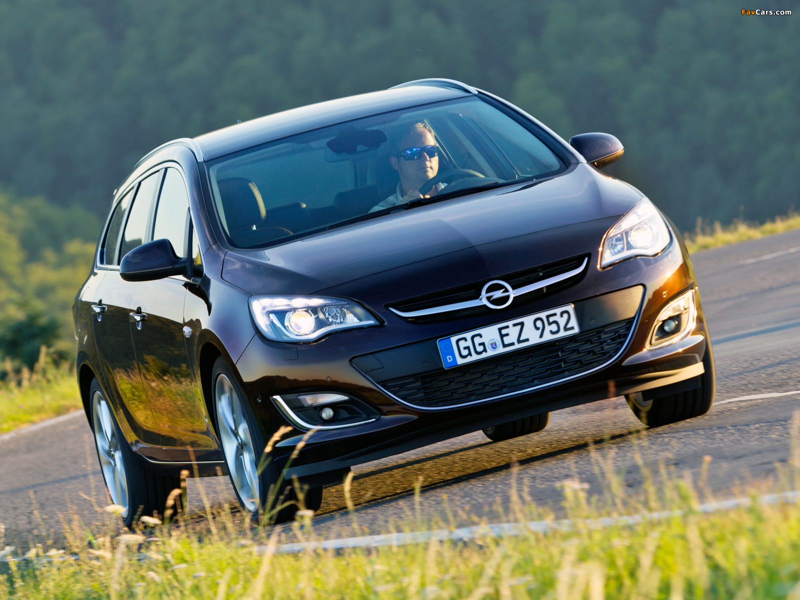 Opel Astra Sports Tourer (J) 2012 photos (1600 x 1200)
