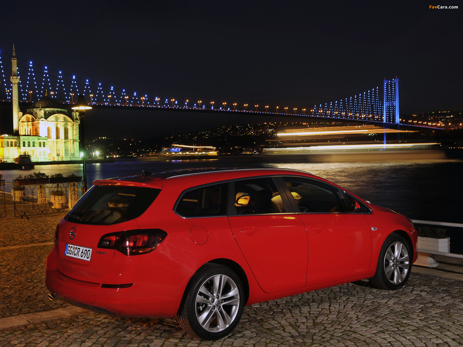 Photos of Opel Astra Sports Tourer (J) 2010–12 (1600 x 1200)