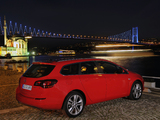 Photos of Opel Astra Sports Tourer (J) 2010–12