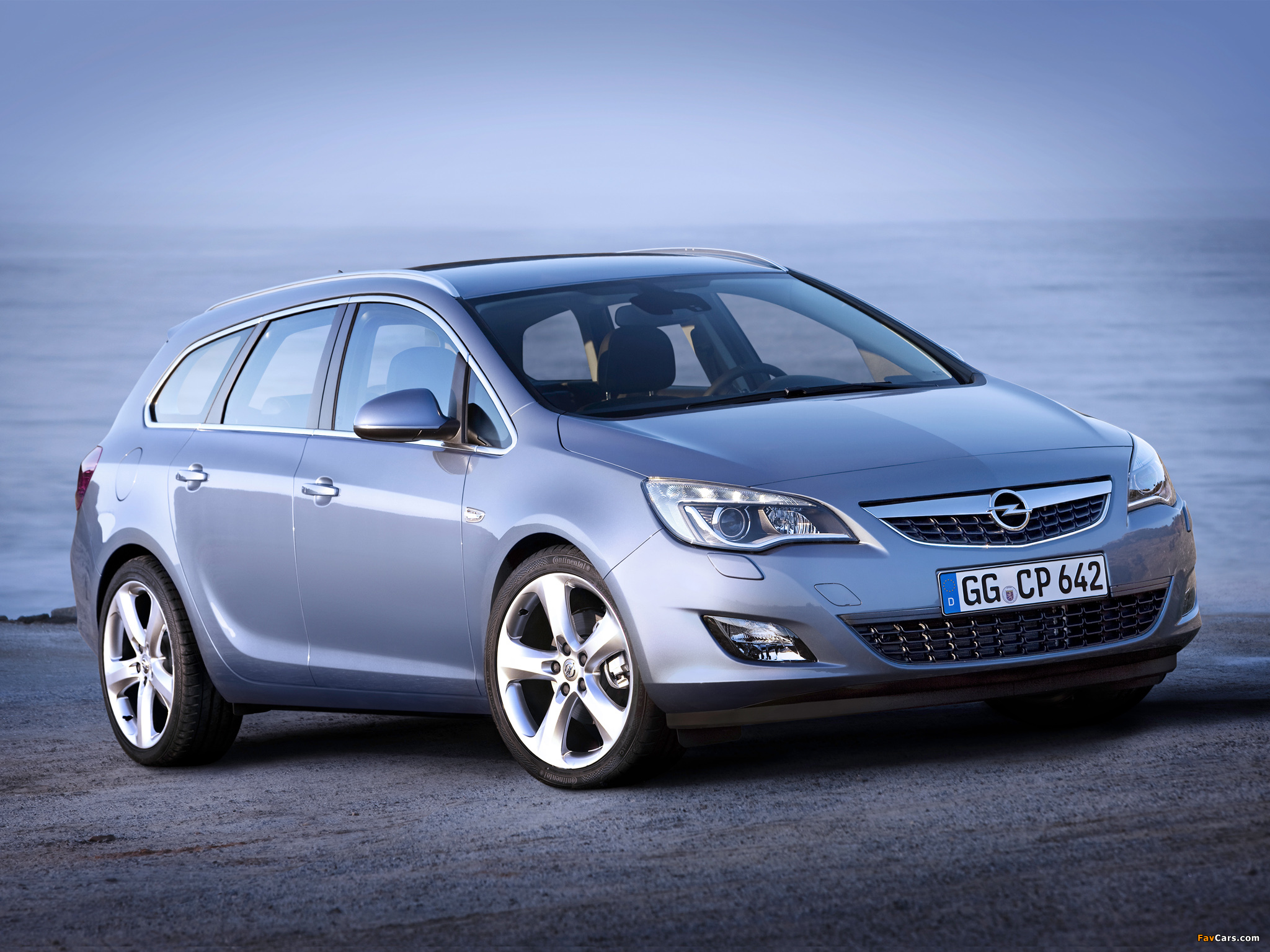 Pictures of Opel Astra Sports Tourer (J) 2010–12 (2048 x 1536)