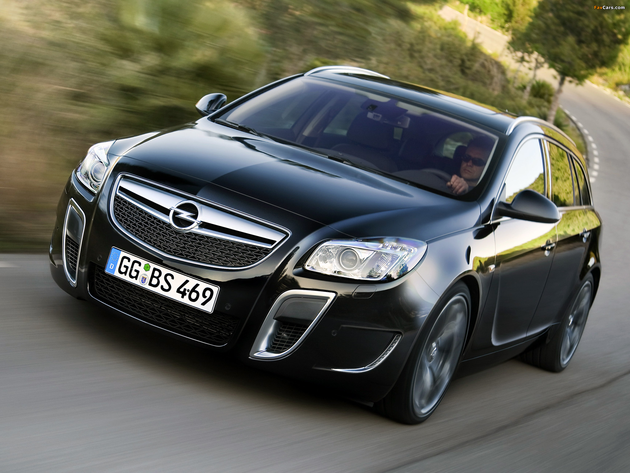 Photos of Opel Insignia OPC Sports Tourer 2009–13 (2048 x 1536)