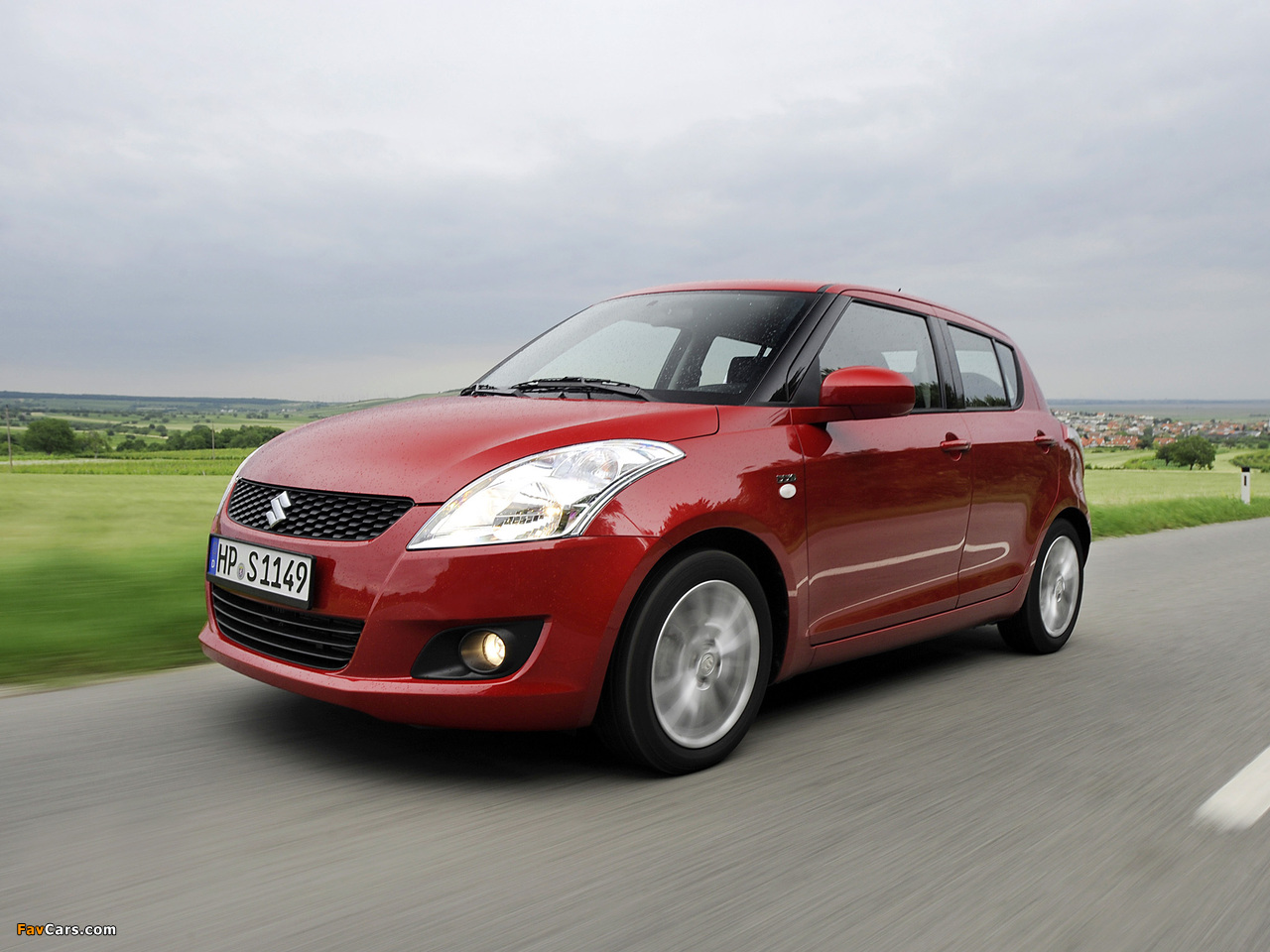 Photos of Suzuki Swift 5-door 2010 (1280 x 960)