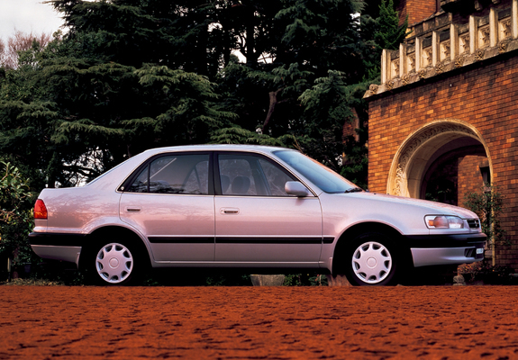 Photos of Toyota Corolla 1.5 SE Saloon (AE110) 1995–96