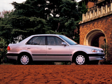 Photos of Toyota Corolla 1.5 SE Saloon (AE110) 1995–96