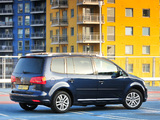 Volkswagen Touran UK-spec 2010 photos